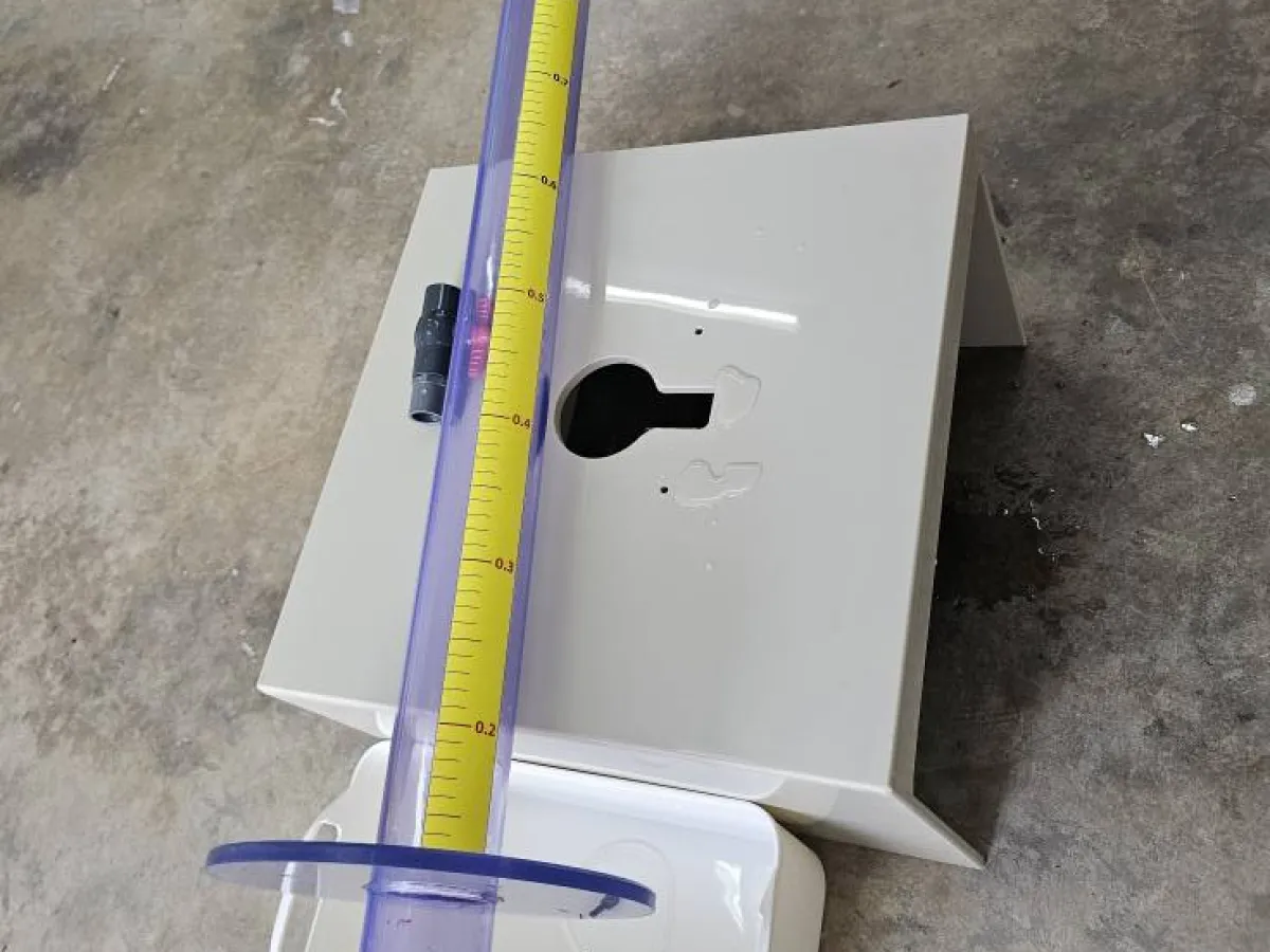 Custom water sensor level tester with clear pipe and plastic base